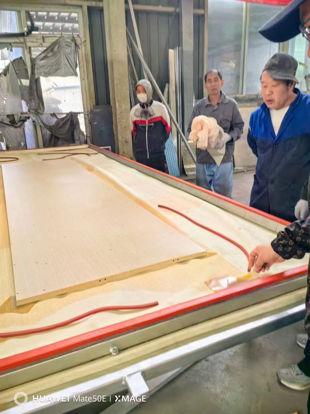 北京奥维高采购的双面加热的木纹转印机已调试完毕